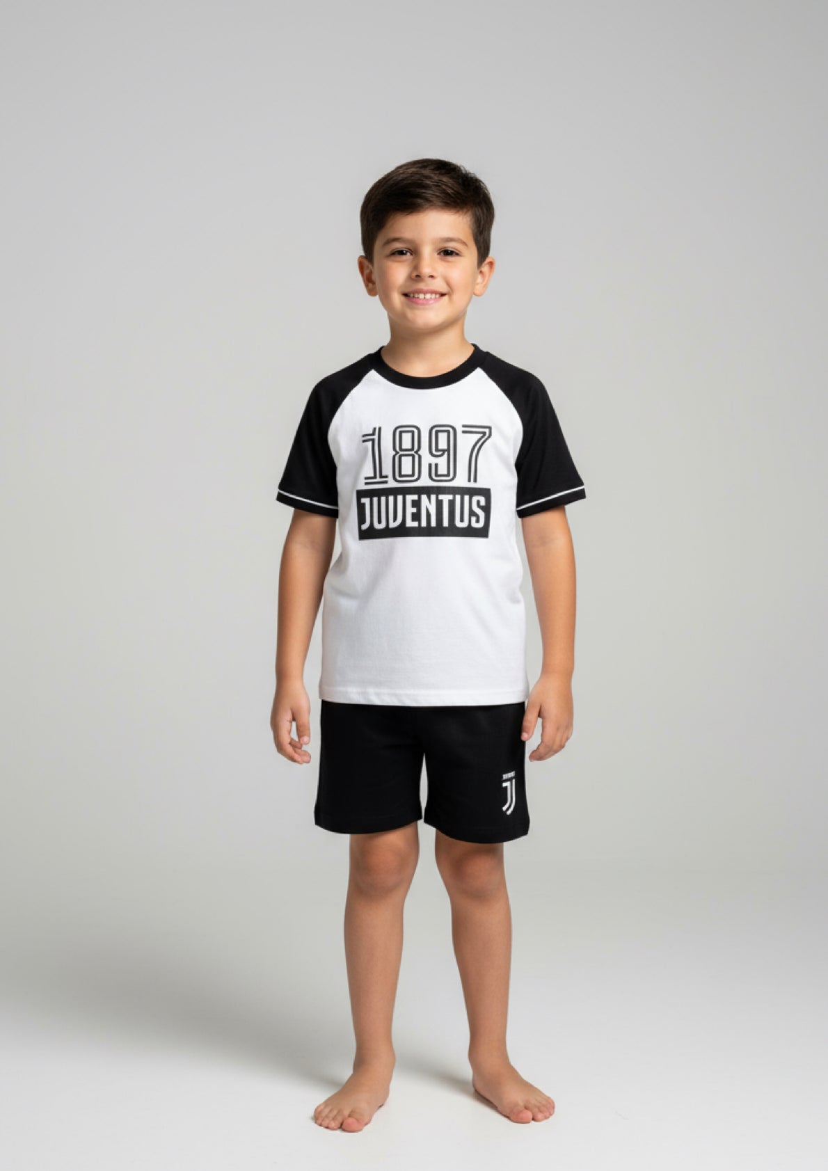 Pigiama bambino Maglia bianca con Mezze maniche nere e pantaloncino JUVENTUS